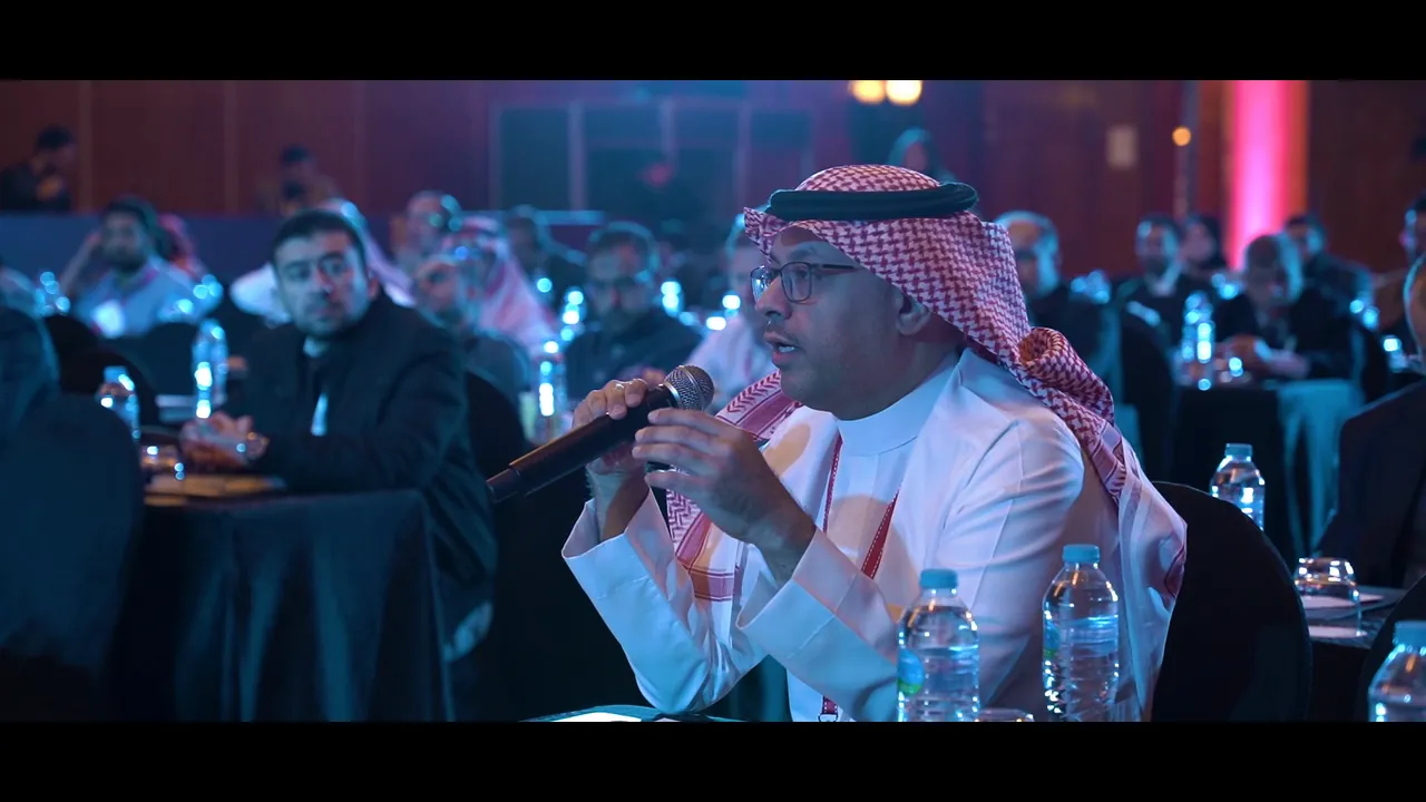 A delegate asks a question